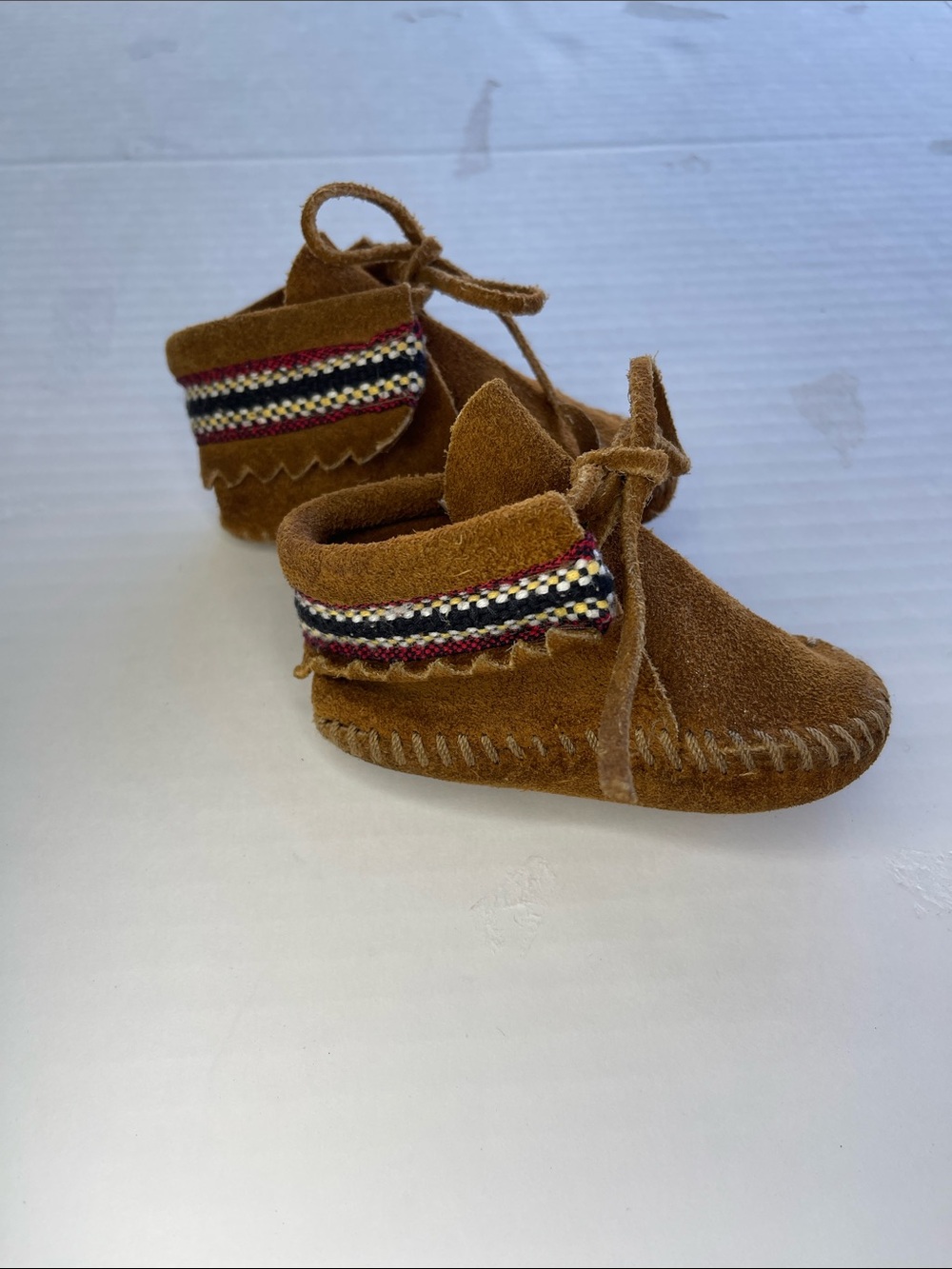 Minnetonka Brown Suede Kids Moccasins with Woven Trim